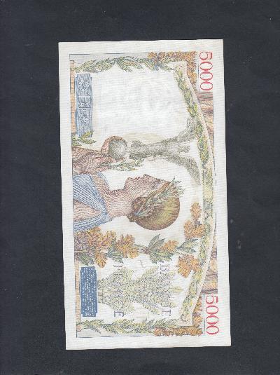 Beschrijving achterzijde: STATUETTE